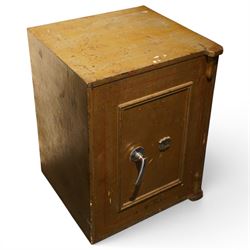 Early 20th century painted iron and steel safe, square form with moulded panel door, appli...