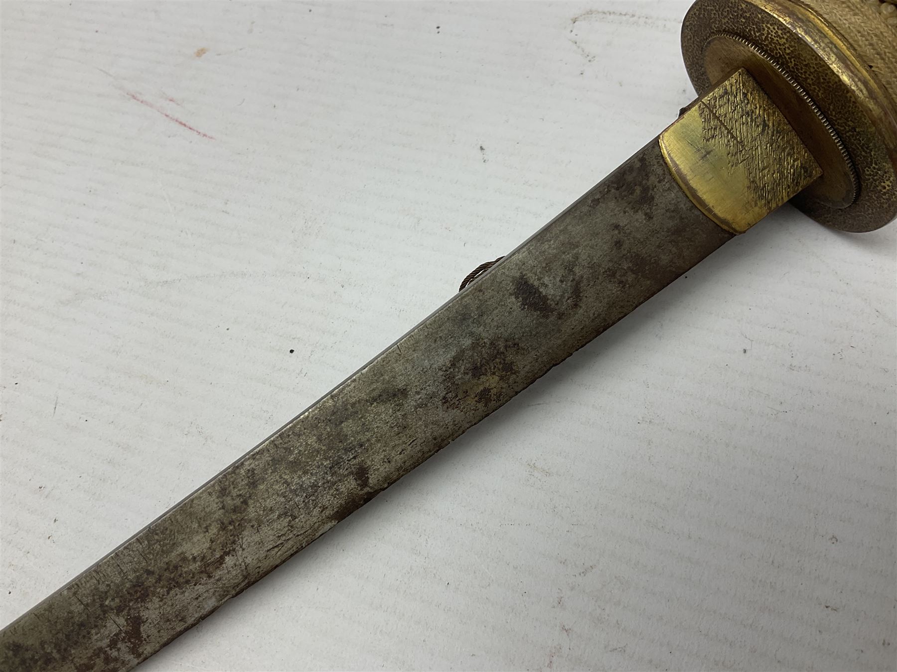 Japanese tanto dagger with 25cm single edged blade, gilded plain punched tsuba, cord bound ray skin grip incorporating menuki and ornate gilded metal mounts L39cm overall