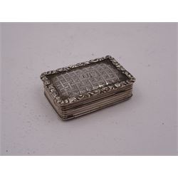 George III silver vinaigrette, of typical rectangular form, with raised foliate rim and engine turned decoration, with banded sides and foliate pierced engraving to gilt interior, hallmarked Birmingham 1797, maker's mark TS, L3cm