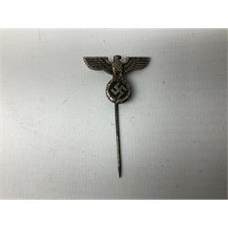 Nine WW2 German lapel pins including five Infantry Assault, Tank Assault etc 