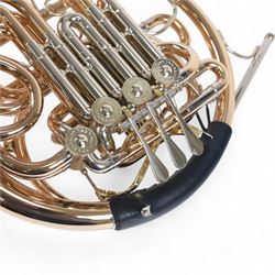 Paxman-Model 25L  French Horn, serial No 3015T. with a fixed bell incorporating the Merewether system of Horn design, in a  yellow lacquered finish with nickel silver valve casings, with Denis Wick precision mute, padded soft carrying case and carrying strap