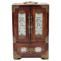 Chinese tabletop greenstone panelled cabinet, with brass mounts, feather pulls, revealing ...