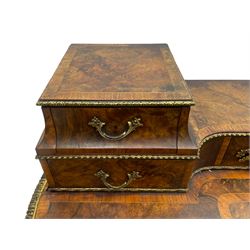 Late 19th to early 20th century French figured walnut writing desk, raised back fitted with drawers, shaped top with Kingwood banding and foliage cast edge moulding, fitted with single drawer, on cabriole supports mounted by shell and flower head cartouches 
