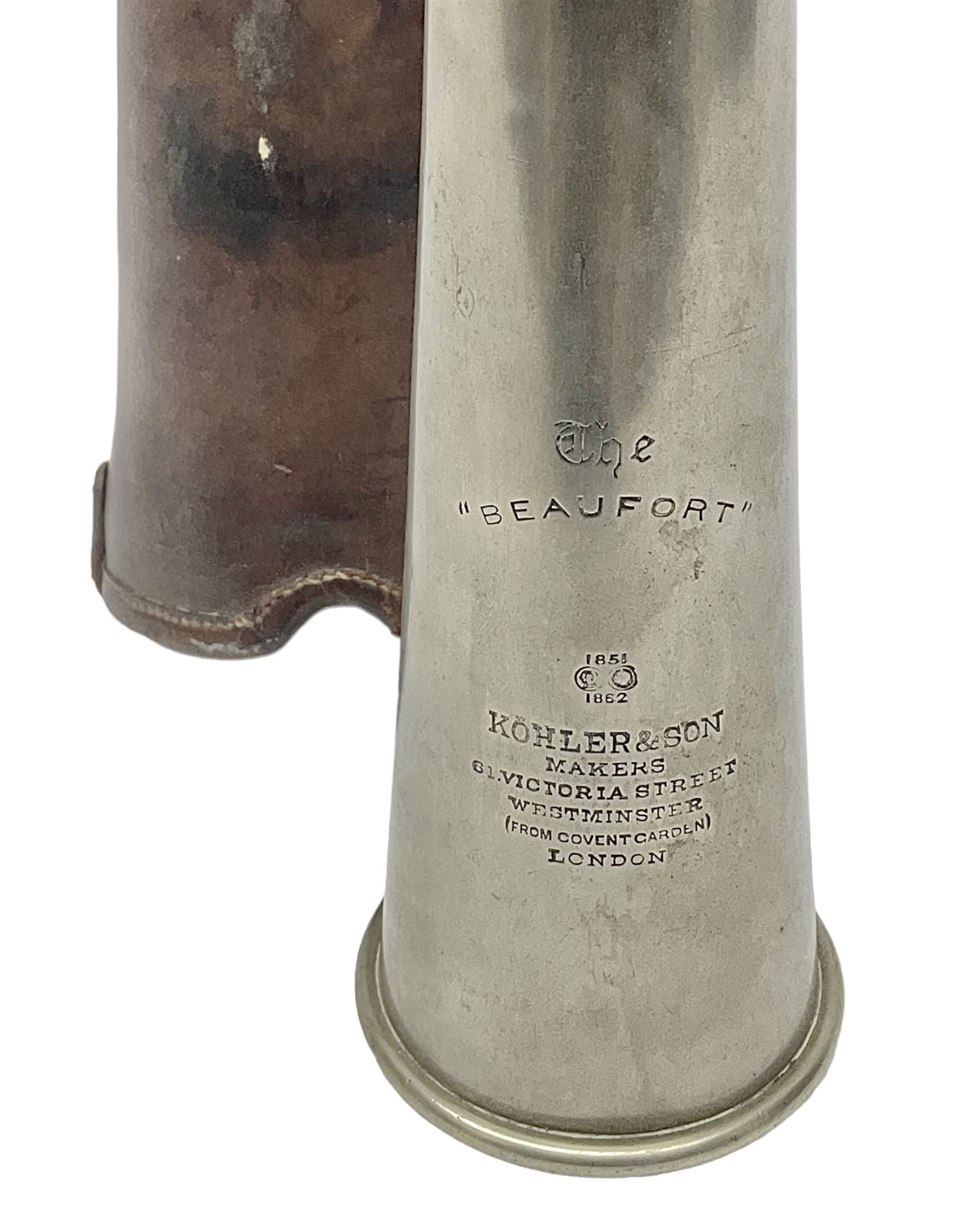 19th century telescopic hunting horn, the bell engraved 'The Beaufort', with makers mark Kohler & Son, makers, 61 Victoria Street, Westminster (from Covent garden) London, in a leather sheath, horn full extended L91cm 
