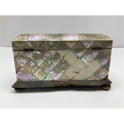 Victorian mother of pearl tea caddy, of rectangular bow-fronted form, the body with floral, bird and geometric engraved mother of pearl panels, white metal shield plaque to the cover inscribed with the initials G.J.A and similar escutcheon, the two division interior with ivory edging and two panelled mother of pearl lids, on four vegetable ivory bun feet L20cm, together with a similar style mother of pearl card case (2) This item has been registered for sale under Section 10 of the APHA Ivory Act