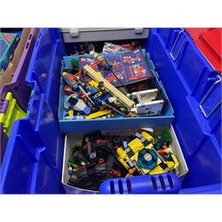 Lego - large quantity of part-built models and loose component parts including Lego Technic and Lego System, space and road vehicles, ships and boats, helicopter etc; together with two set boxes and folder  containing large quantity of instruction booklets; stored in two very large plastic boxes