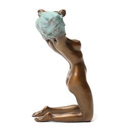 Bronze figure of a kneeling nude removing her shirt, signed 'Milo', H17cm