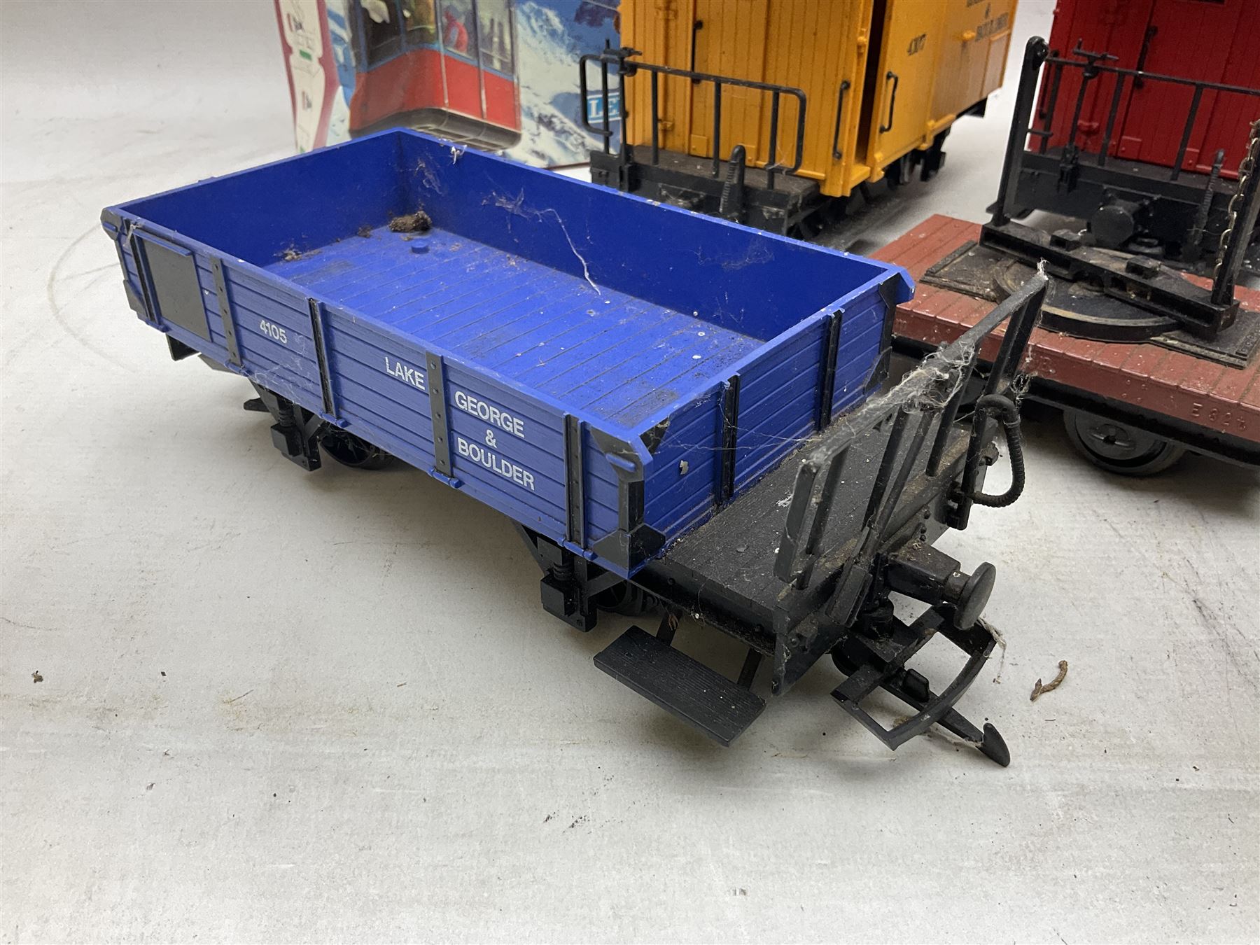 Three LGB (Lehmann Gross Bahn) G scale, gauge 1, rolling stock wagons, comprising two Lake George and Boulder wagons and an Auto Express wagon, together with a LGB passenger coach, other LGB rolling stock and a Lehmann Rigi900 ski lift