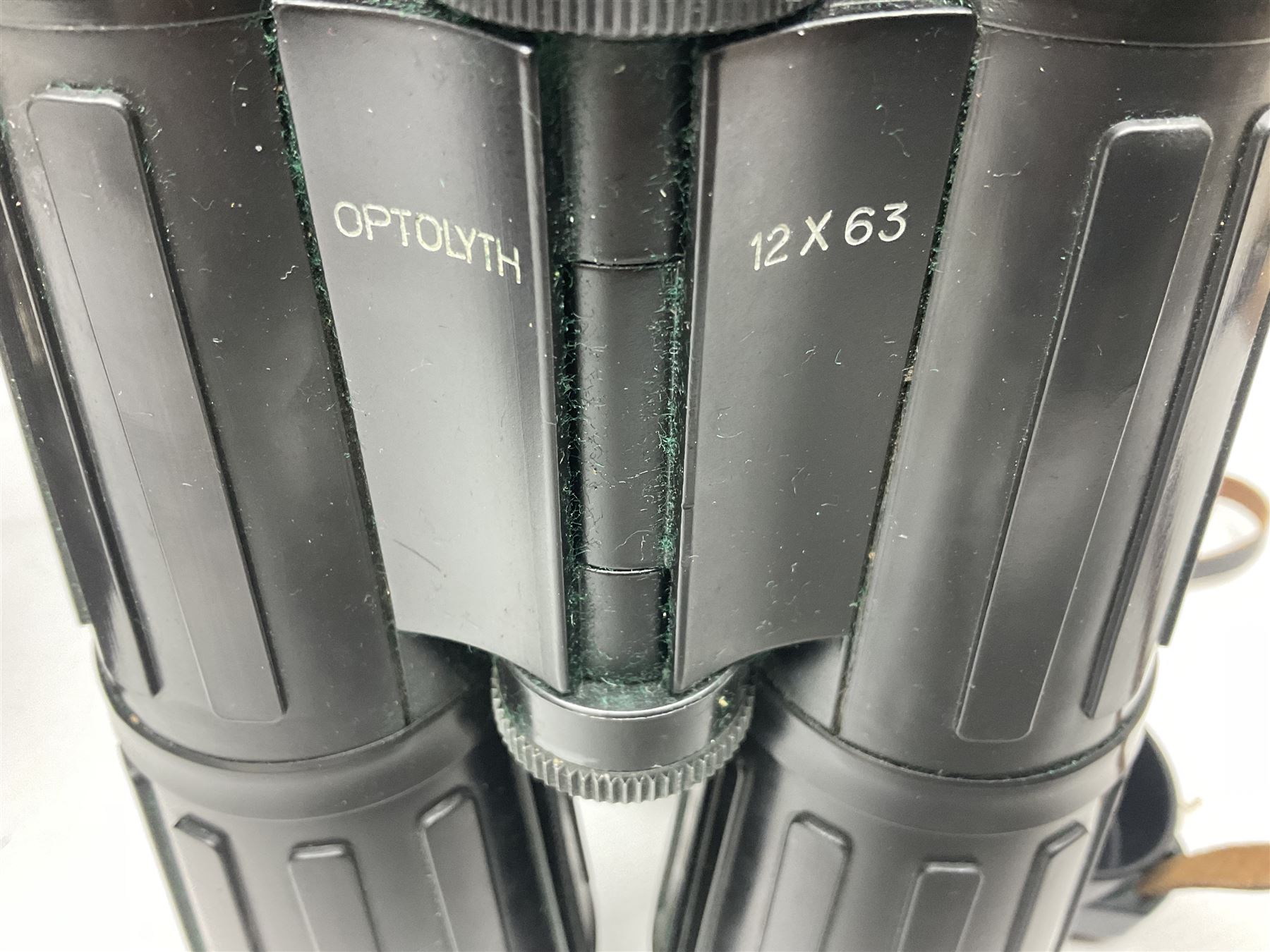 Pair of Optolyth 12 x 63 binoculars, made in Germany, serial no 82186, in leather case