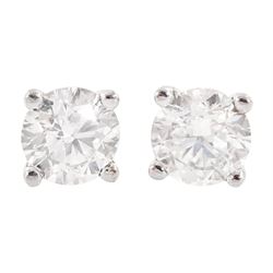 Pair of 18ct white gold diamond stud earrings, stamped 750, total diamond weight approx 0.80 carat
