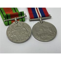 WWI pair of medals comprising British War Medal and Victory Medal awarded to 32682 Pte. W. Meadows W. Rid. R. in issue box; WWI pair of medals comprising 1914-15 Star and Victory Medal awarded to 3720 Pte. (later Cpl.) E. Petty W. York. R. with issue letter from Tank Corps; WWII group of five medals comprising 1939-45 War Medal, Defence Medal and 1939-45, Italy and Africa Stars; all with ribbons; and book of nineteen seaman's Certificates of Discharge to cook Charles Filburn 1893 - 1901 from various British ports