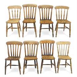 Eight Victorian farmhouse chairs in elm and beech, spindle-back frames with moulded seats,...