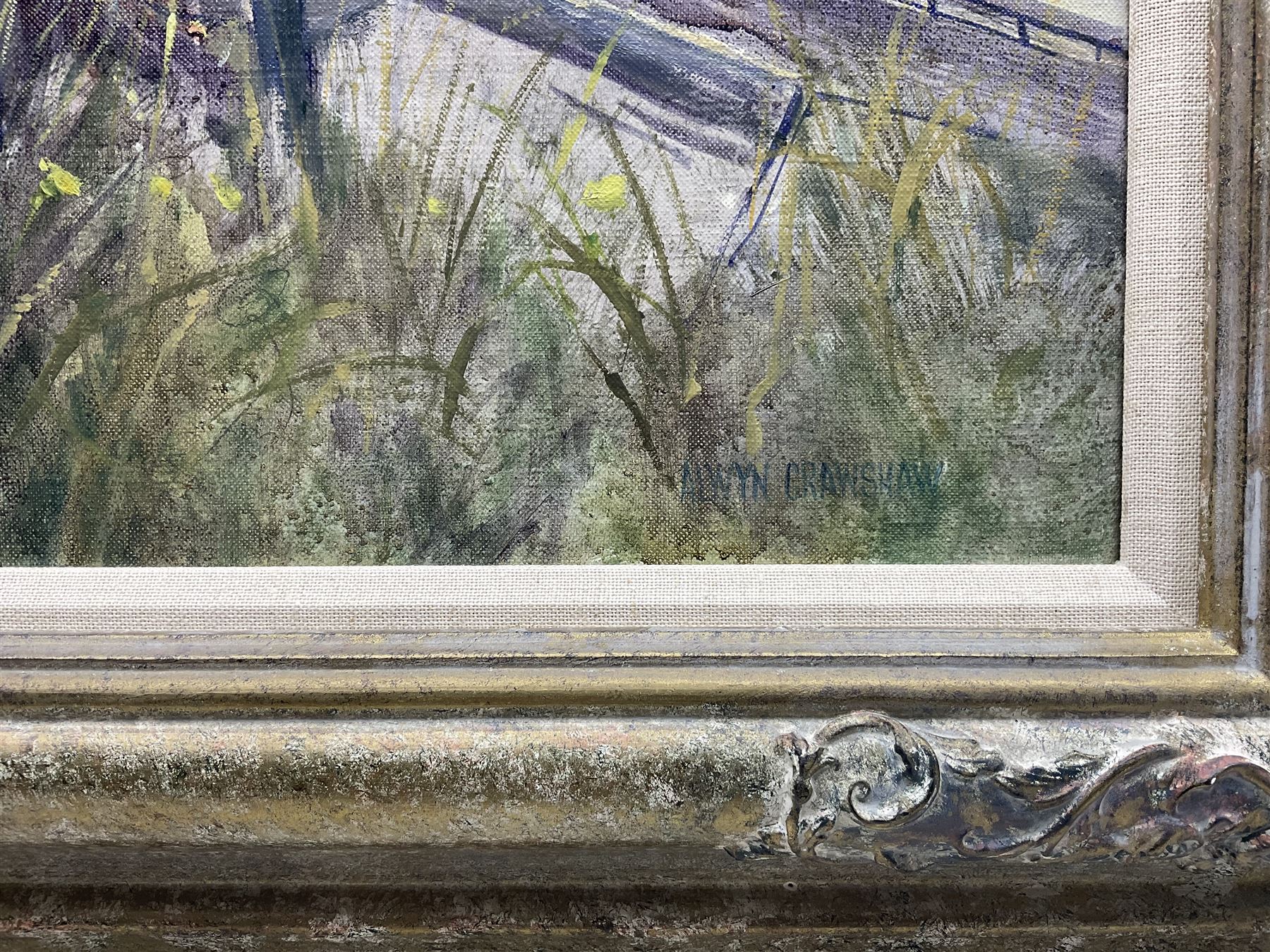 Alwyn Crawshaw (British 1934-): 'Early April Sun - Whitby' - View from the Abbey looking down onto South Bay, oil on canvas signed, inscribed verso 40cm x 50cm