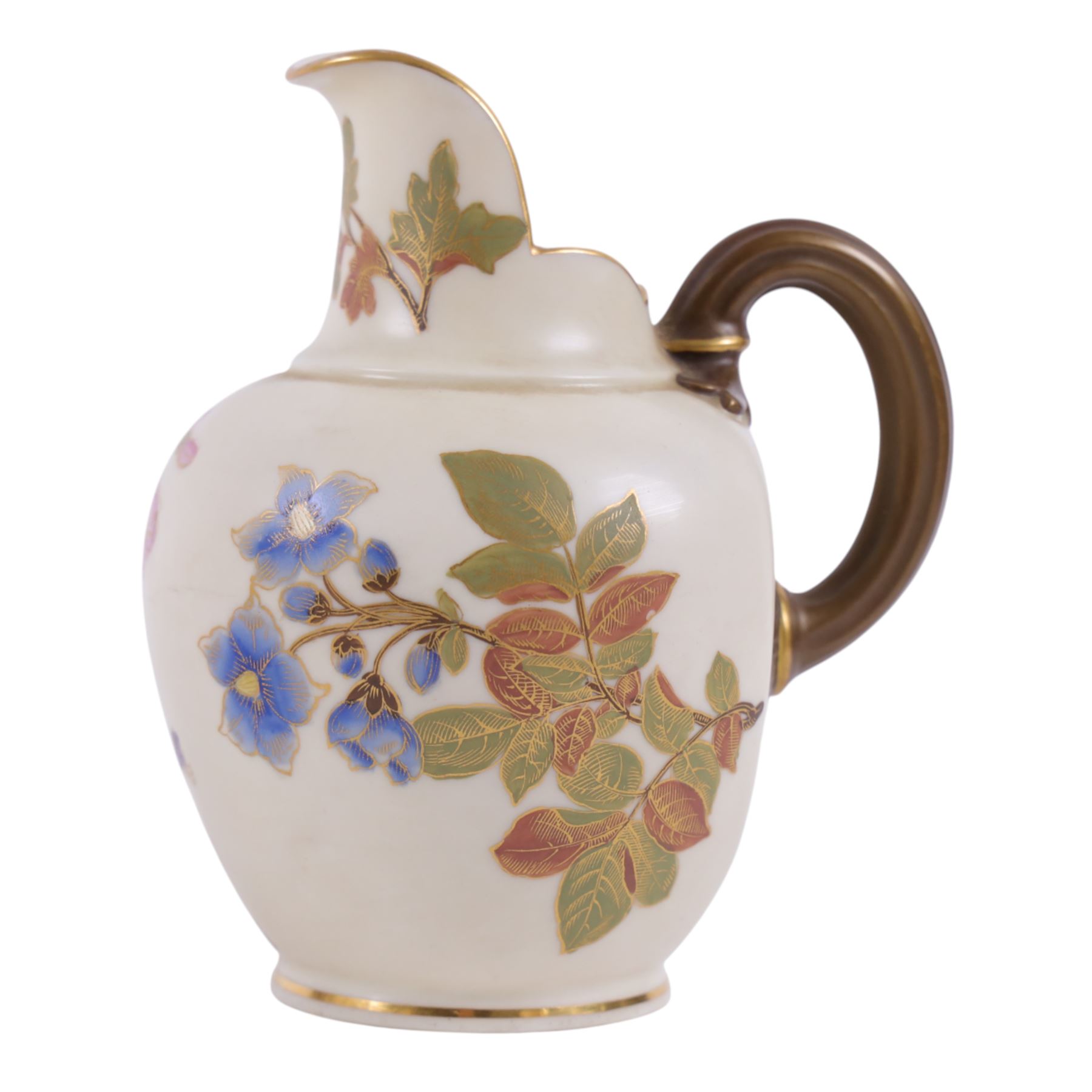 Five Royal Worcester Blush Ivory jugs, comprising one shape 1085 example with bamboo handle, one shape 1376 example with floral decoration and gilt handle and three shape 1094 examples, each decorated with floral sprigs, with printed marks beneath, tallest H14cm