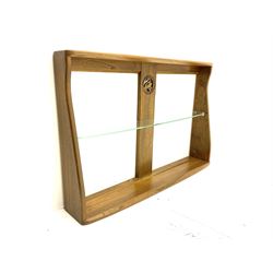 Ercol medium elm two tier wall plate rack, and additional Ercol two tier wall plate rack, with glass shelf and swan detail. 