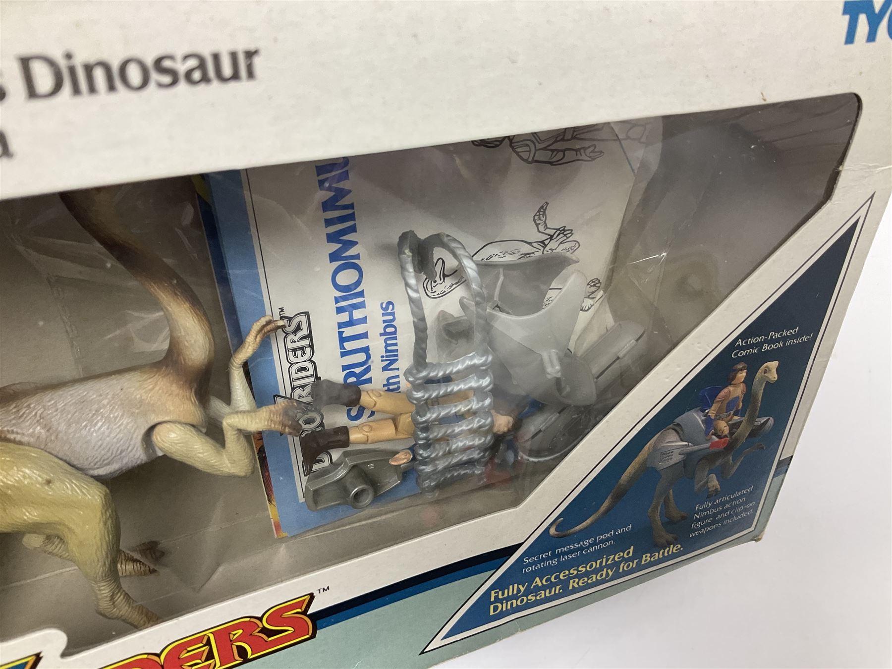 Dino-Riders 1980s by Tyco Action-GT, Stegosaurus with Tark and Vega Heroic Dino-Riders; Triceratops with Hammerhead and Sidewinder Evil Rulon Warriors; and Struthiomimus with Nimbus Heroic Dino-Rider; all boxed; two Action Figures, re-bagged on original card backing; and two VHS video tapes (6)
