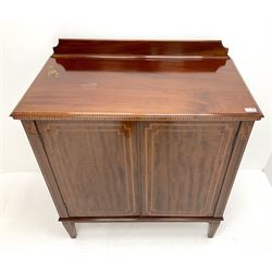 Edwardian inlaid mahogany cabinet, raised shaped back, two doors enclosing fitted interior, square tapering supports