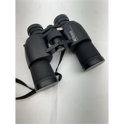 Four pairs of binoculars, to include Carl Zeiss Jena Jenoptem 8x30W serial no. 3750814, Nikon Sporting II 8x40 serial no. 604672, Minolta Pocket II 8x22 Field 7 and Jessops 12x25 Field 4.8 84m/1000m, all in carrying cases 