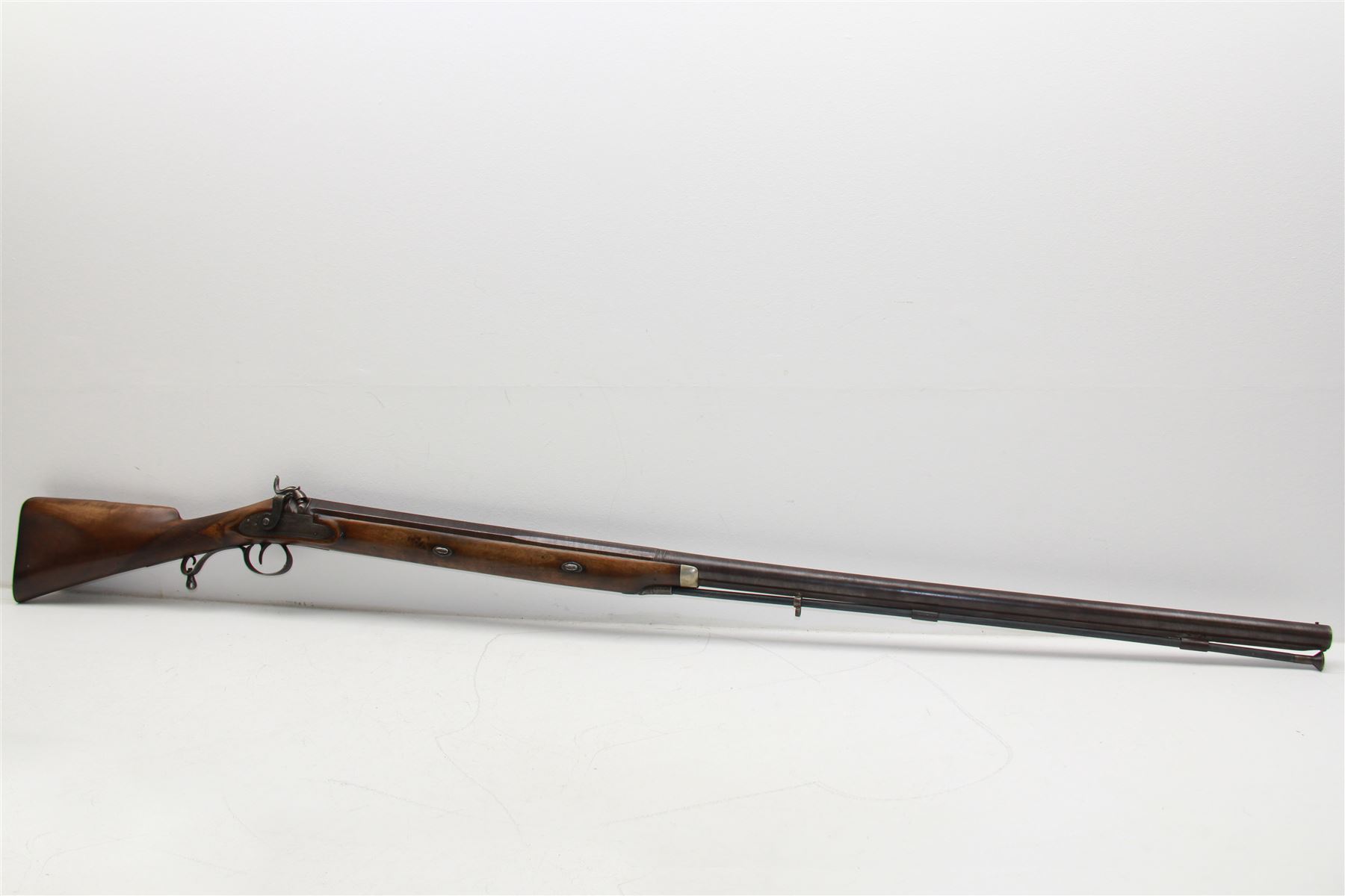 19th century Jones single barrel percussion fire shotgun, muzzle loader, walnut stock with chequered grip and engraved steel fitting marked Jones, the 68cm (27