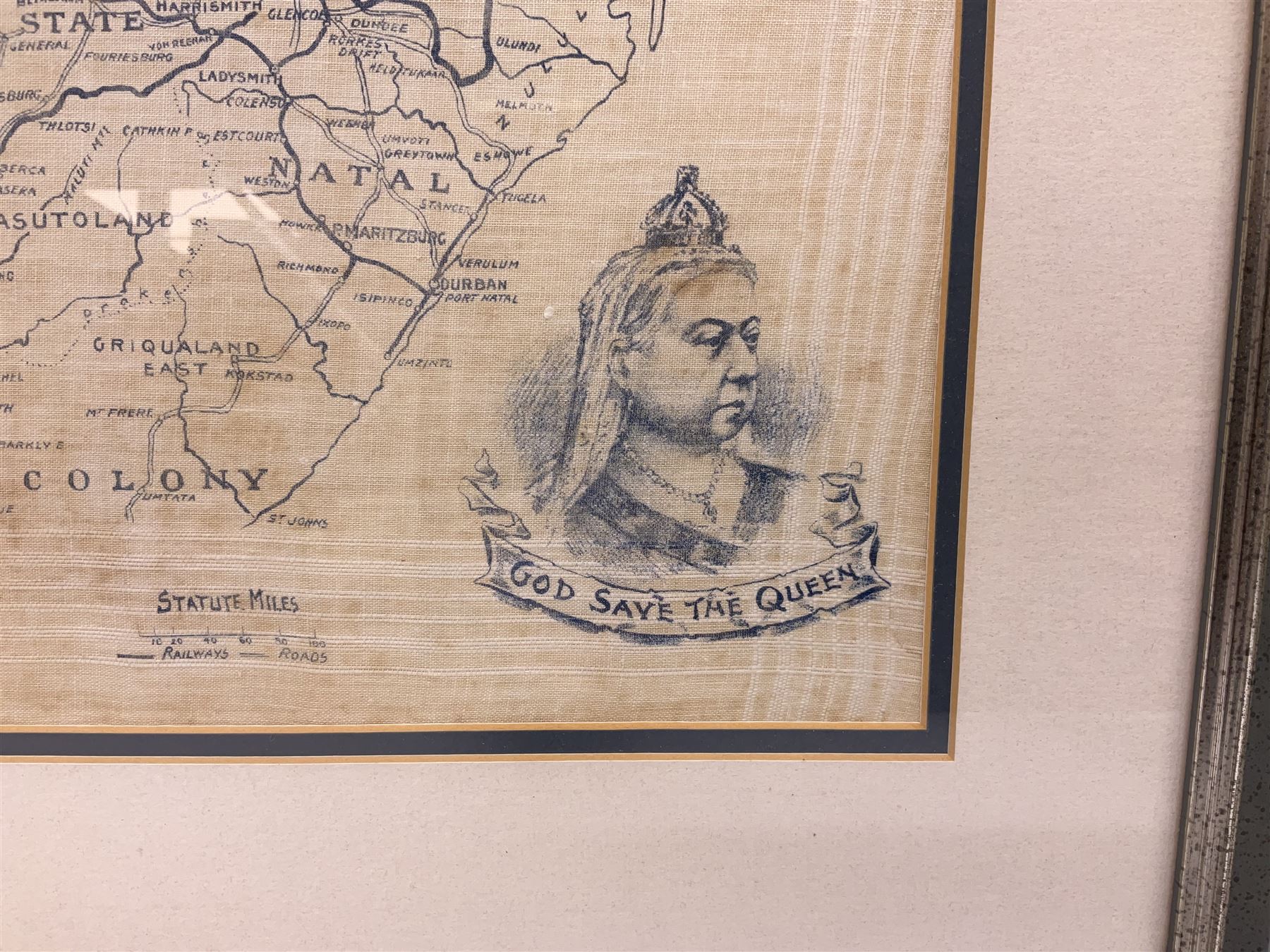 Boer War cotton handkerchief printed with portraits of Lord Roberts and Queen Victoria with a map of Southern Africa and Kipling's The Absent Minded Beggar, framed, handkerchief 44.5 x 43cm