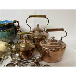 Three copper kettles, a pair of brass candlesticks, telephone, large jardiniere and a collection of other metal ware