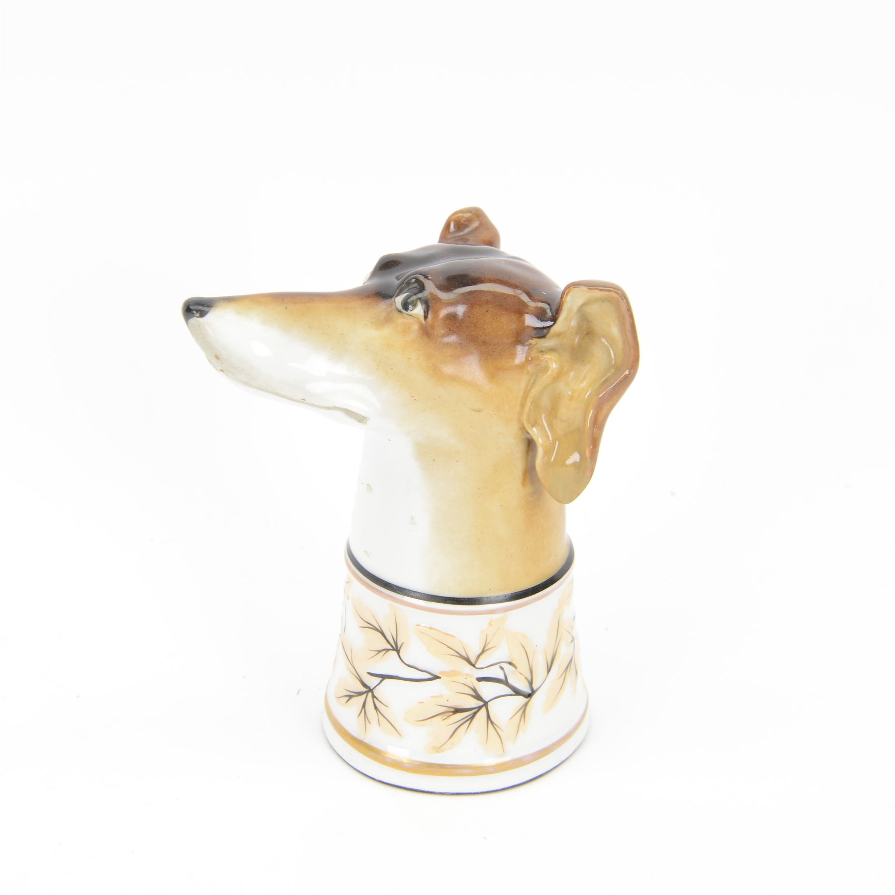 Late 19th century Continental porcelain stirrup cup, modelled as a hounds head, with wide collar detailed with lustre vines, H14.5cm