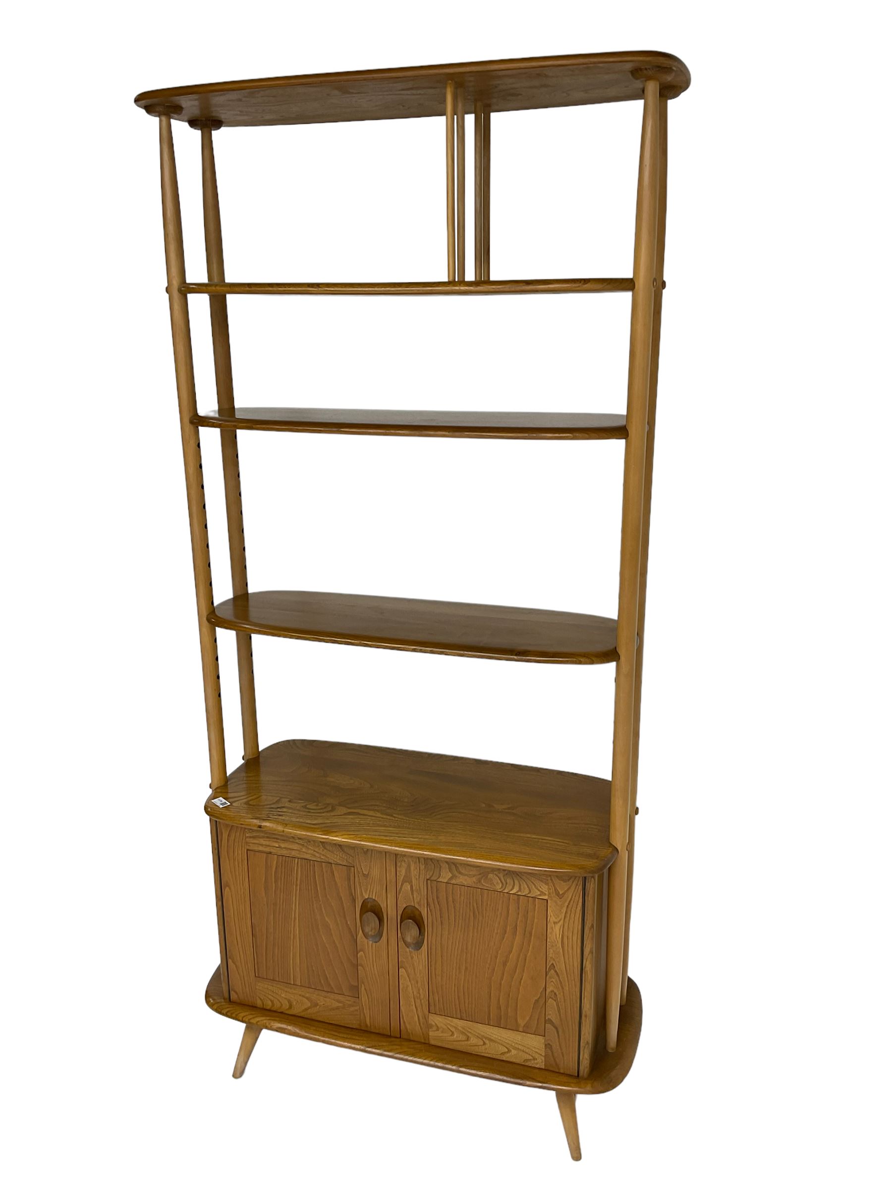 Ercol - 'Giraffe' elm and beech room divider, fitted with shelves and double cupboard