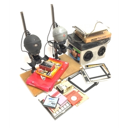 Large quantity of photography equipment - various 35mm and other film, Daylab 300, Leitz Valoy II enlarger and another Leitz enlarger, Paterson rotary trimmer, Photax Darkroom Safelight, JOBO - Automat 35, OHNAR Zoom reverser etc...