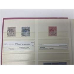 Mostly Great British stamps, including King Edward VII two shillings and sixpence, five shillings and ten shillings, King George V seahorses, King George VI high values, Queen Elizabeth II pre and post decimal etc, housed in a pink stockbook 