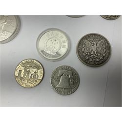 United States of America 1896 Morgan one dollar coin, 1893 'Columbian Exposition' commemorative half dollar, 1945 standing Liberty half dollar, Queen Elizabeth II Australia 1993 one ounce fine silver dollar, Canada 1967 and 1995 one dollar coins etc (15)