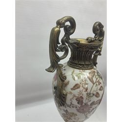Wong Lee, twin handled ceramic urn with enamelled floral decoration and bronzed metal mounts, upon a square base, marked to base, together with similar twin handled urn with enamelled Cherub decoration, largest H44cm