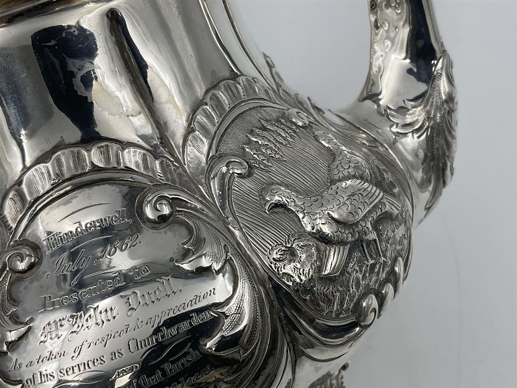 Victorian silver three piece tea service, comprising teapot, twin handled open sucrier, and milk jug, each of bellied form with acanthus capped scroll handles, the sides embossed with alternating scroll edged vacant panels and panels containing a pair of birds, upon four palmette feet, the teapot with ivory insulators to handle, and bird finial to the hinged domed cover, hallmarked William Hunter & Son, London 1861, teapot H19cm, including handles sucrier H13.5cm, including handle milk jug H12cm

This item has been registered for sale under Section 10 of the APHA Ivory Act