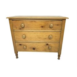 Late 19th century waxed pine chest, fitted with three drawers, raised on turned supports 