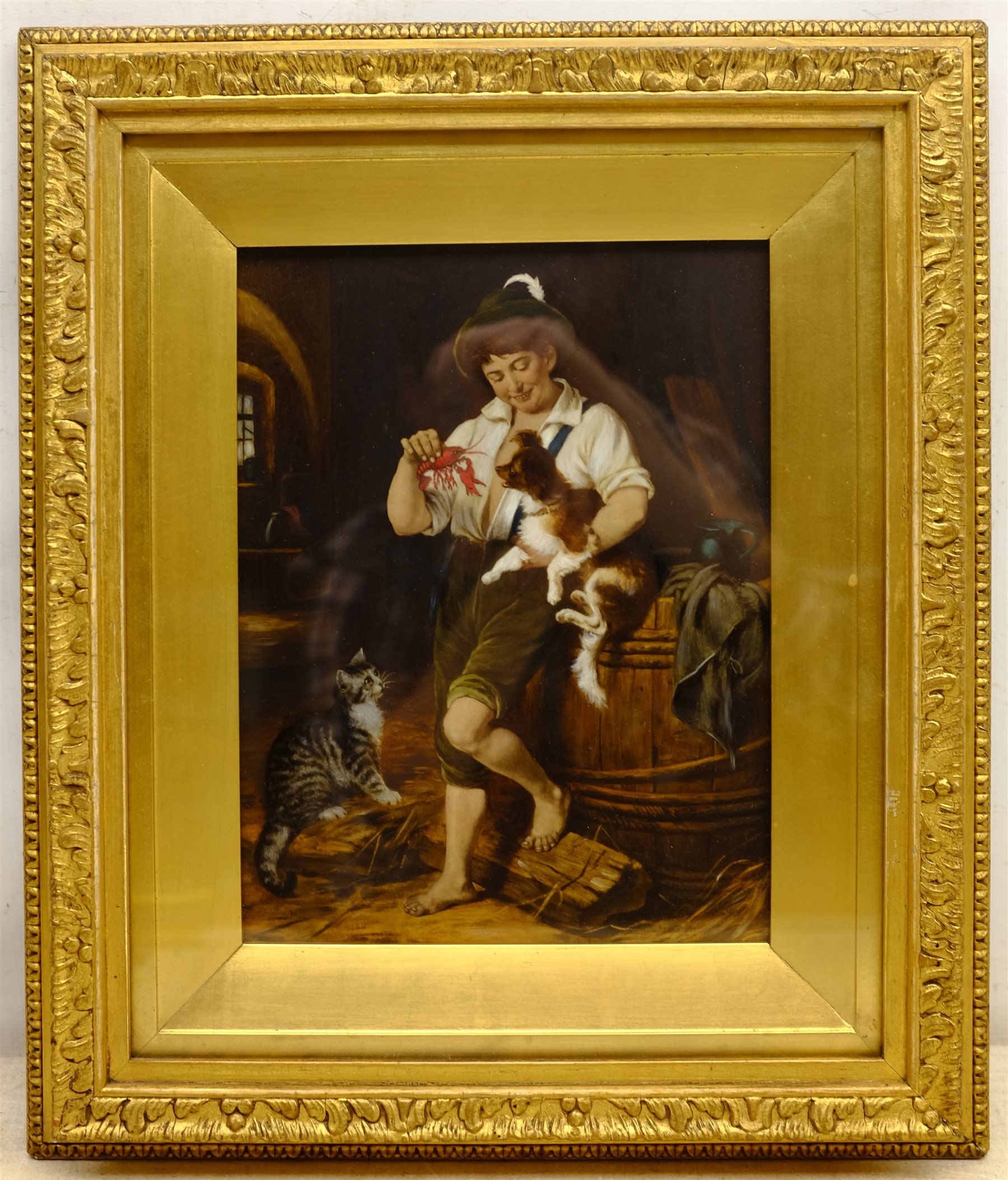  English School (19th century): Young Boy with Dog and Lobster, oil on glass indistinctly signed under the mount  