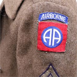Army long wool jacket, with US Army WWII 82nd Airborne division patch, stamped inside 36R
