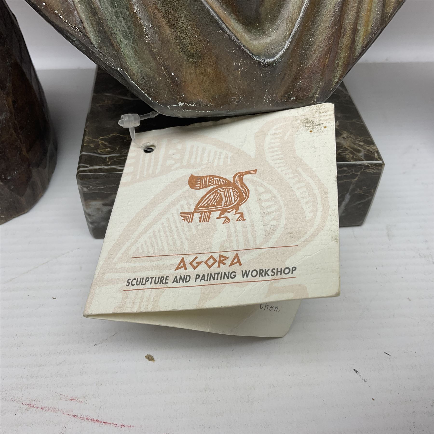 Bronzed bust of Greek man upon a marble base, together with two wooden sculptures 