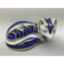 Three Royal Crown Derby paperweights, comprising Misty, exclusive to the RCD Collectors Guild during 2003, Grey Kitten, modelled as a sitting cat, with original box, and Platinum Arctic Fox, all with gold stoppers, and further associated box, tallest H8cm