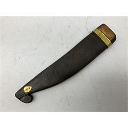 19th century Singhalese knife pia kaetta, the 20cm steel blade inset with yellow and white metal, with metal mounted carved pistol grip, in plain wooden scabbard L33cm overall