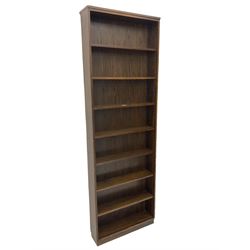 Narrow oak bookcase with adjustable shelves
