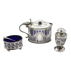 Silver mustard and pepperette by Goldsmiths & Silversmiths Co Ltd, London 1919 and a pierced silver salt hallmarked