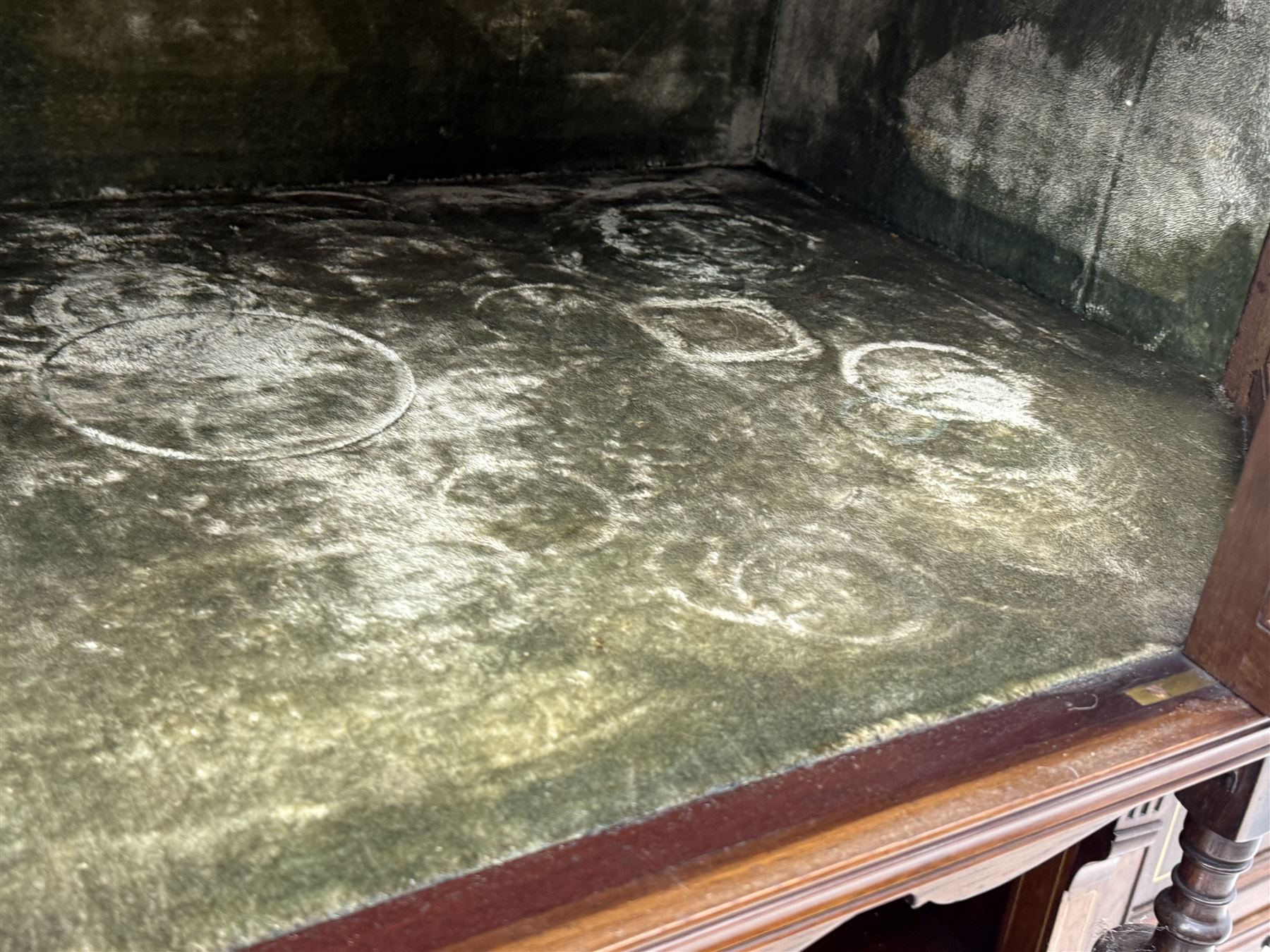Victorian hardwood and inlaid display cabinet, central breakfront glazed display with astragal glazing and mirror back, flanked by mirrored alcoves with turned supports, below foliate and scrolling marquetry panels enclosing cupboard doors, shaped open shelves with turned supports beneath, on tapered and spade feet