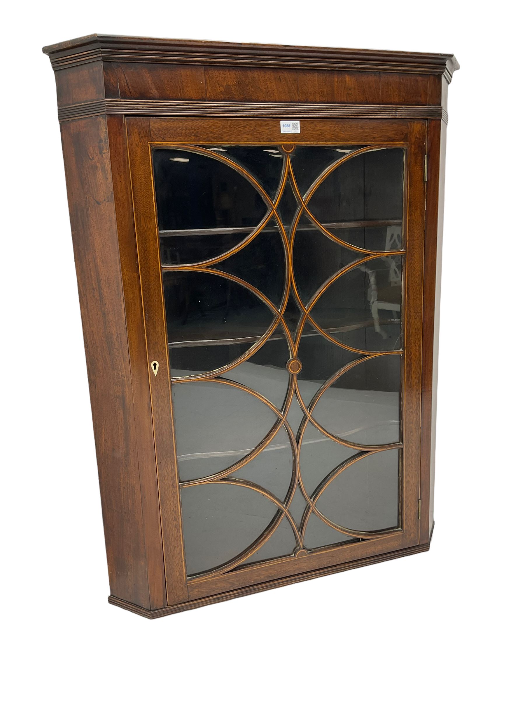 Georgian mahogany wall hanging corner cabinet, enclosed by single door with curved interlacing astragal glazing 