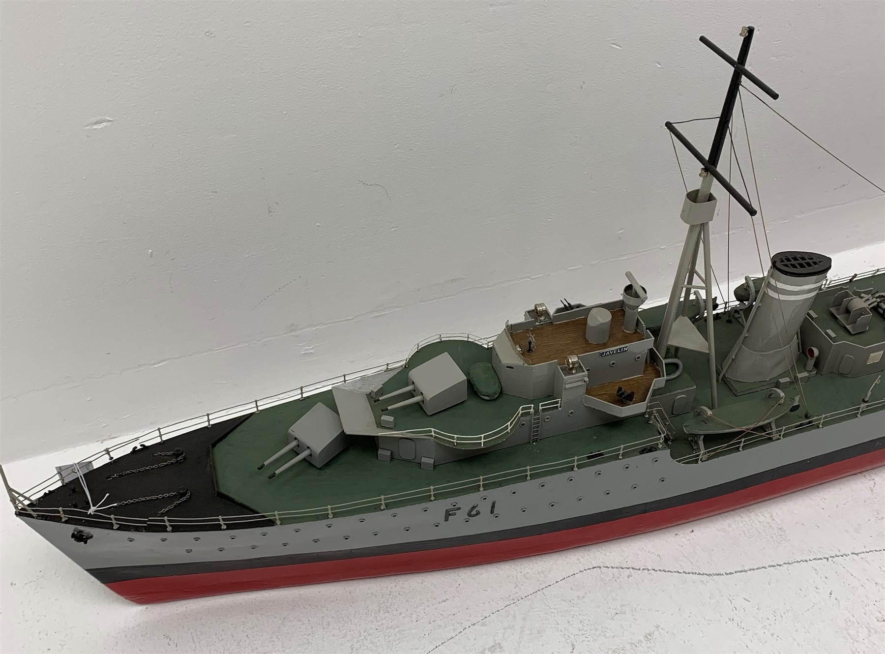 Large scale model of the Destroyer Javelin F61 painted in battle colours, with plans, L178cm, W22cm, H61cm. 