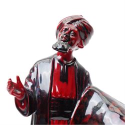 Royal Doulton flambe figure 'The Carpet Seller' HN2775 and another exclusively for the Collectors Club  'Geisha' HN3229 (2)