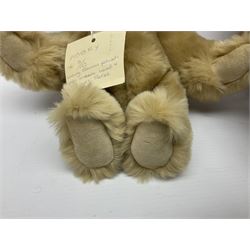 Group of five teddy bears comprising ‘George’ a unique pellet filled bear with glass eyes and velvet paws H38cm, and ‘Abbey’ a luxury German plush with wobble head and glass eyes no.5/10 H24cm, both with Teddies from Bearyland labels; along with two light blonde mohair H. M. Bears and Boyds Bears ‘T. F. Wuzzies’ no. 595140 (5)