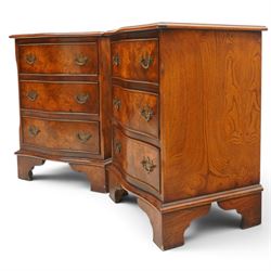 Pair of Georgian design figured elm serpentine bedside chests, moulded top raised on bracket feet