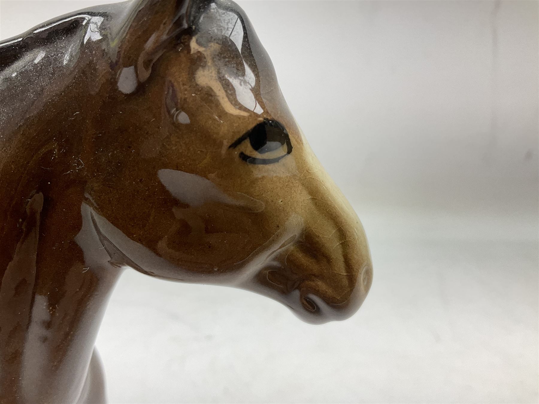 Seven Beswick figures of horses, including Connemara pony in grey no.1641, Arab in bay no.1265, large foal in grey no.947 etc, together with a Goebel figure of a horse (8)