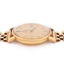 Omega gentleman's 9ct gold automatic wristwatch, gilt dial with baton hour markers and date aperture, back case engraved Tool 106, on a 9ct gold brick link bracelet, London 1976