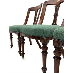 Set of four Victorian mahogany spoon back dining chairs, upholstered seats