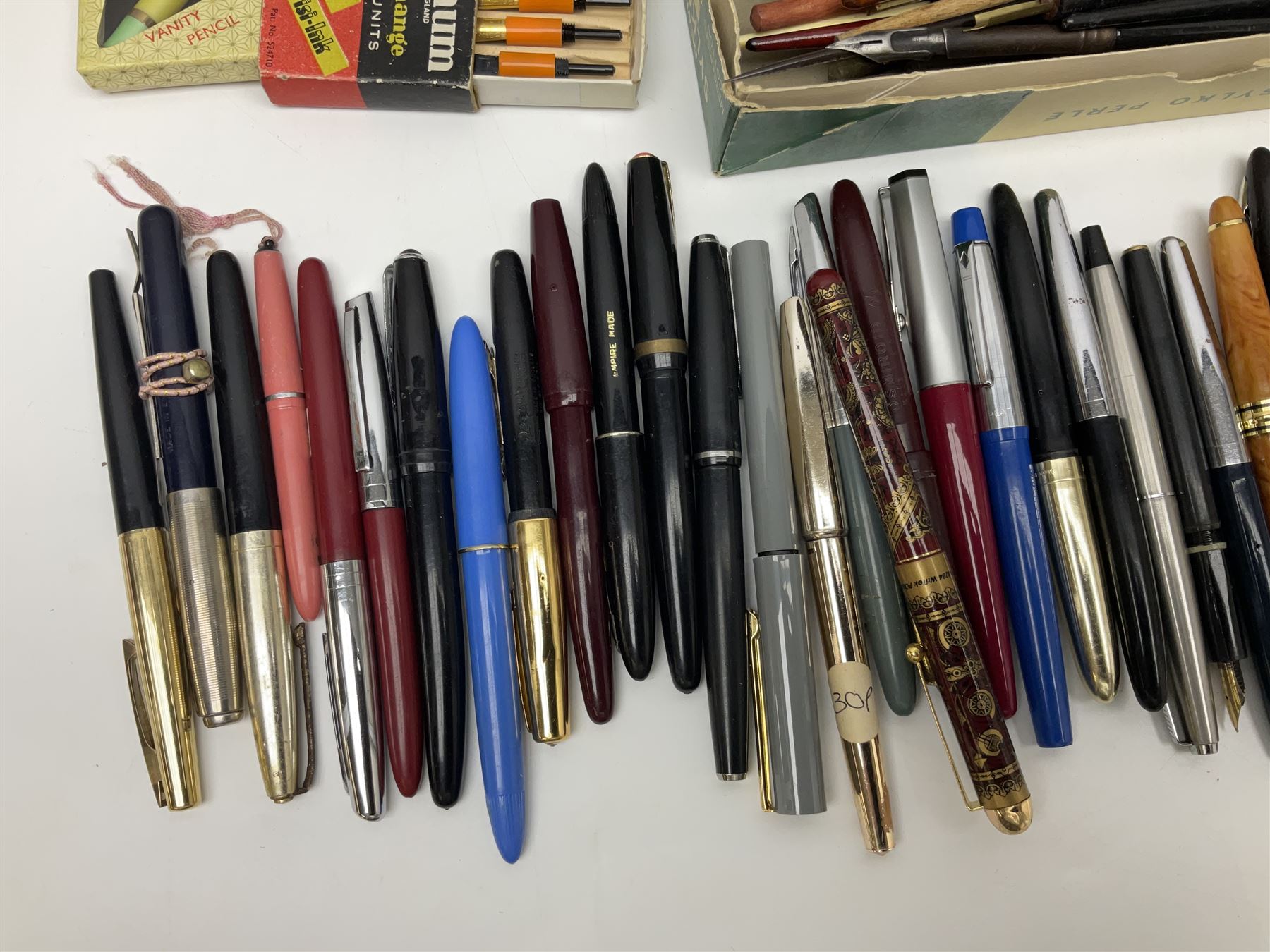 Large quantity of fountain and calligraphy pens, to include examples by Parker, Waterman, Platignum, Universal and Osmiroid, together with a selection of nibs